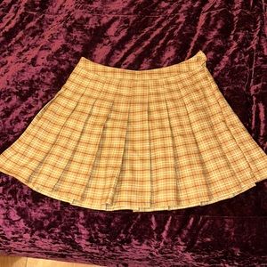 Plaid and pleated school girl skirt.